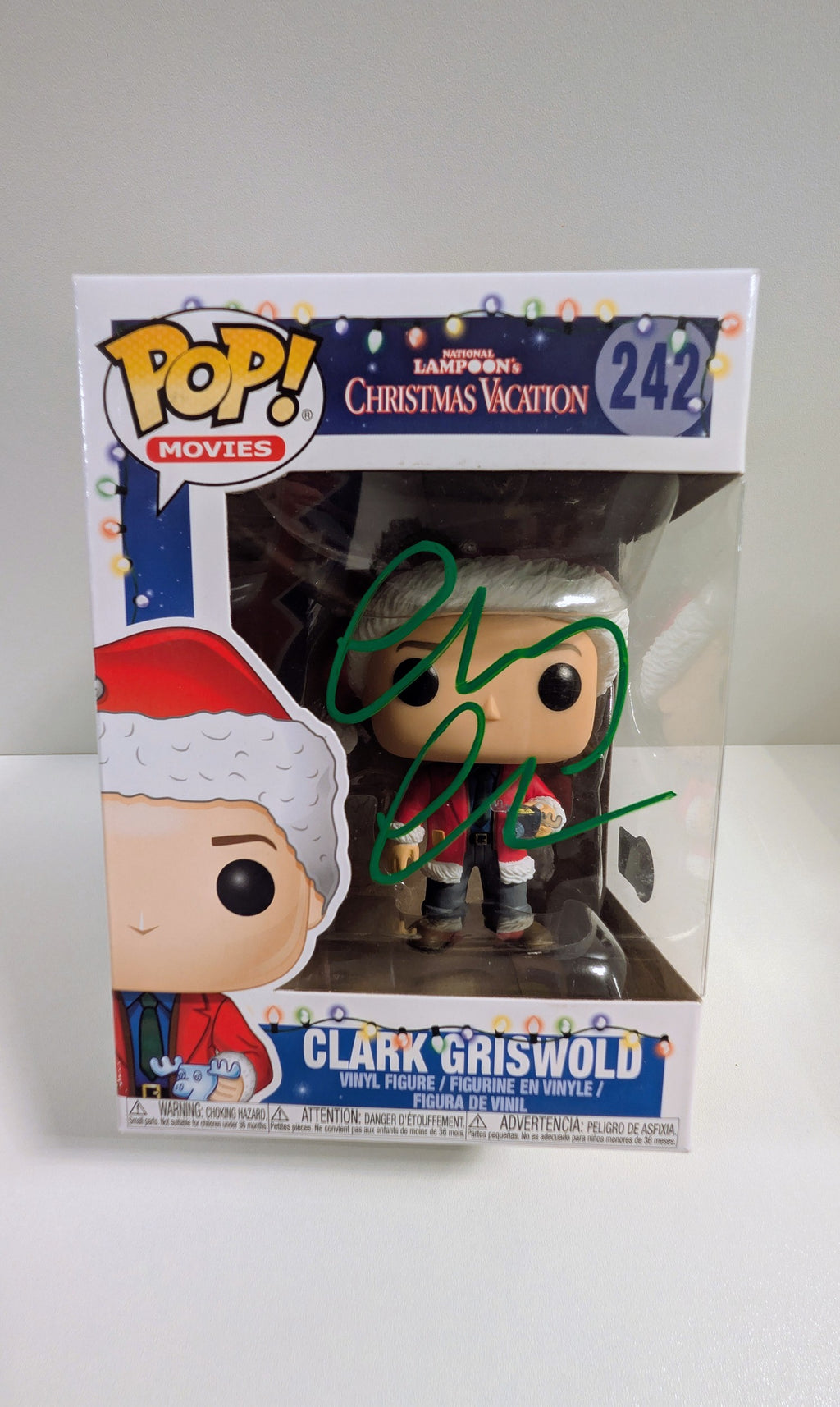 Clark Griswold #242 | Signed by Chevy Chase